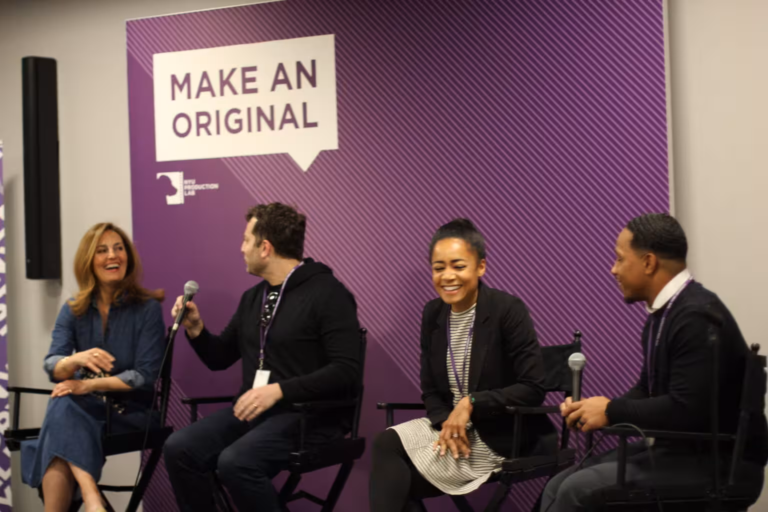 Panelists share a laugh during the 2022 speaker panel